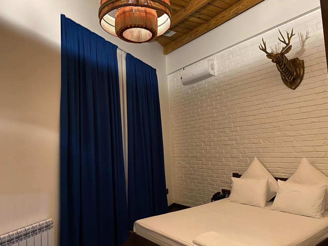 Alpen Park Hotel Shymkent Quarto foto